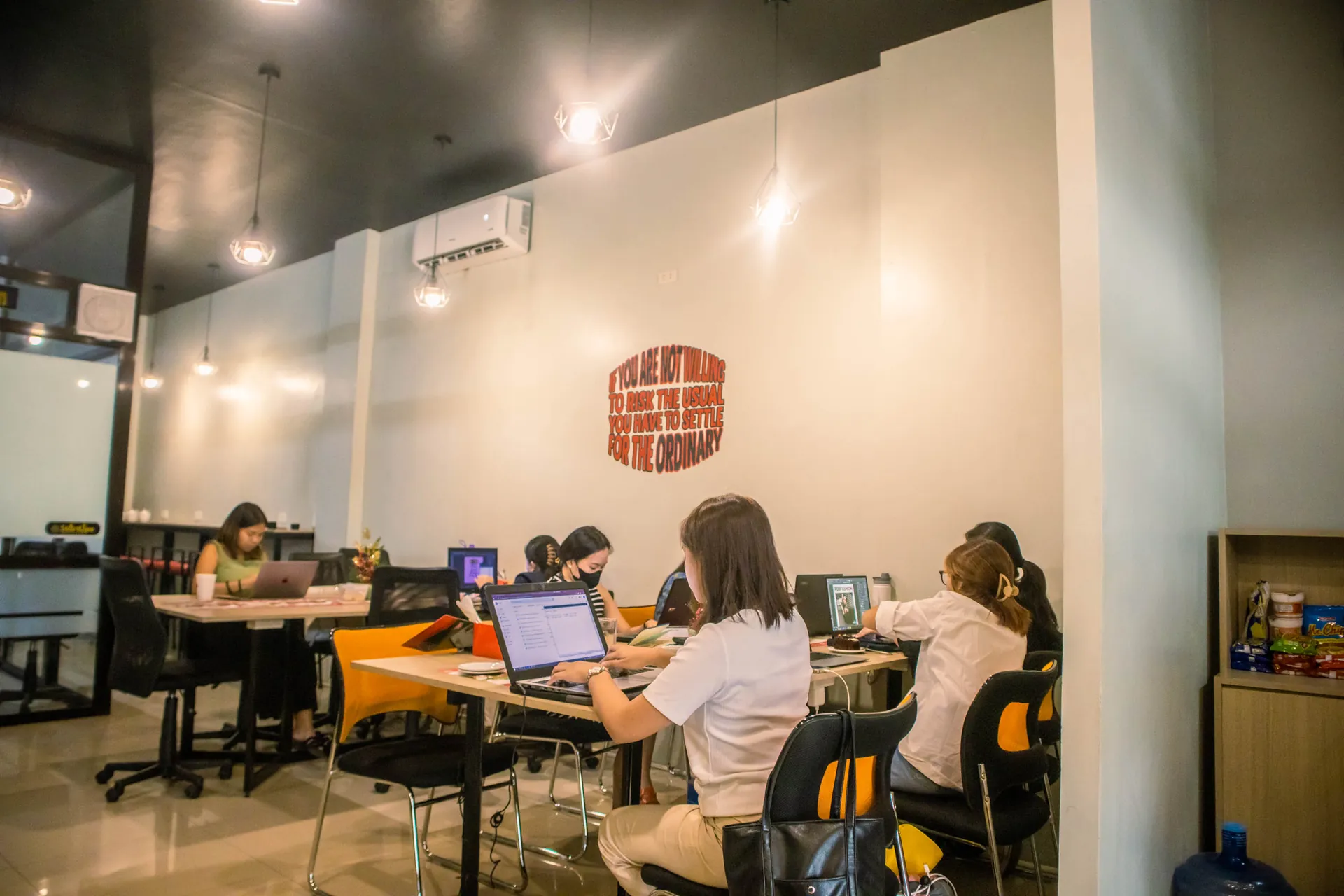 People working at StartUpz coworking space